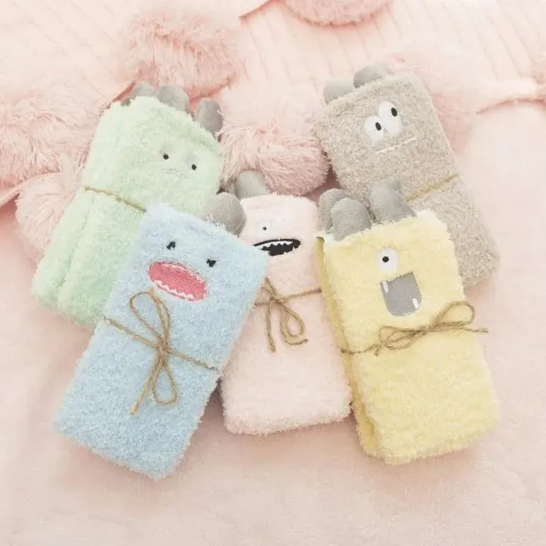Little Monster Socks: Fuzzy socks with funny faces