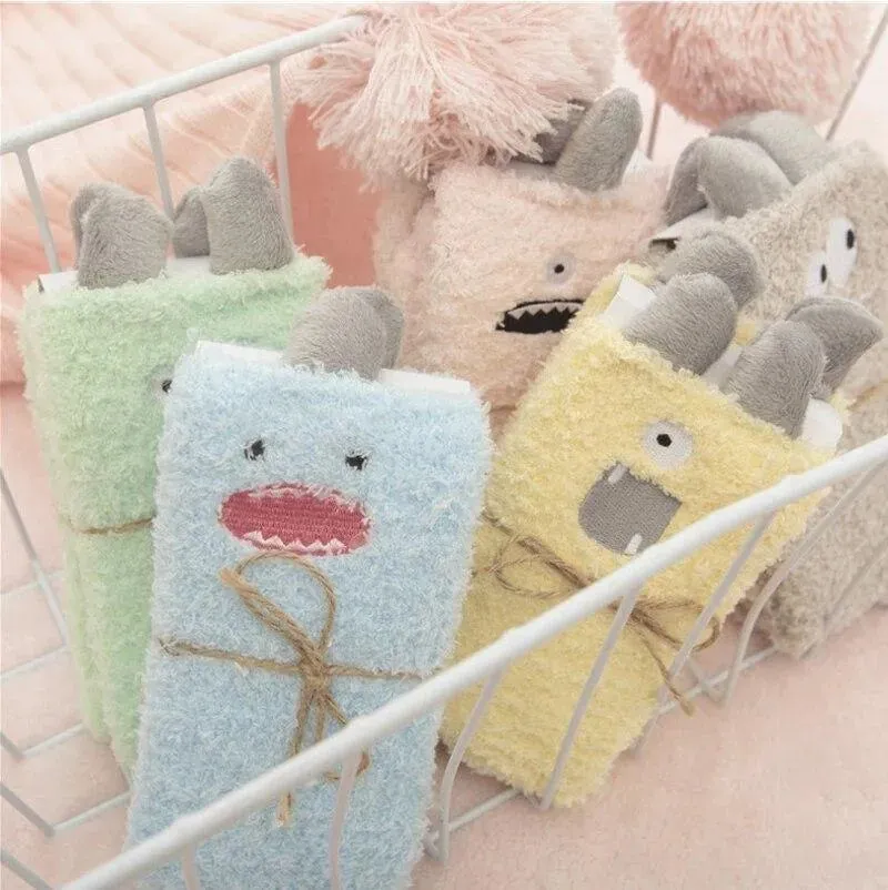 Little Monster Socks: Fuzzy socks with funny faces