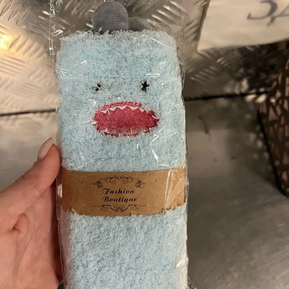 Little Monster Socks: Fuzzy socks with funny faces