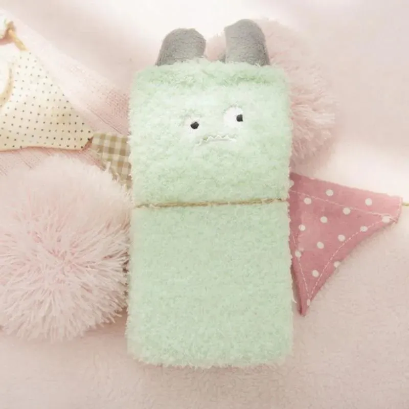 Little Monster Socks: Fuzzy socks with funny faces