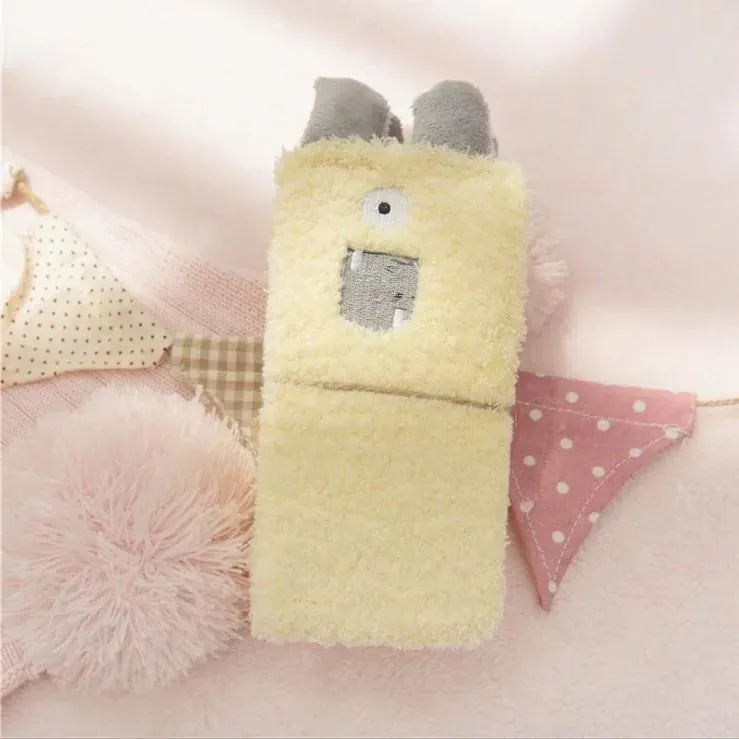 Little Monster Socks: Fuzzy socks with funny faces
