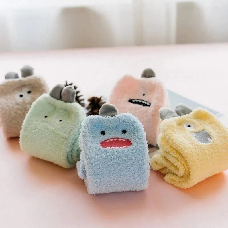 Little Monster Socks: Fuzzy socks with funny faces